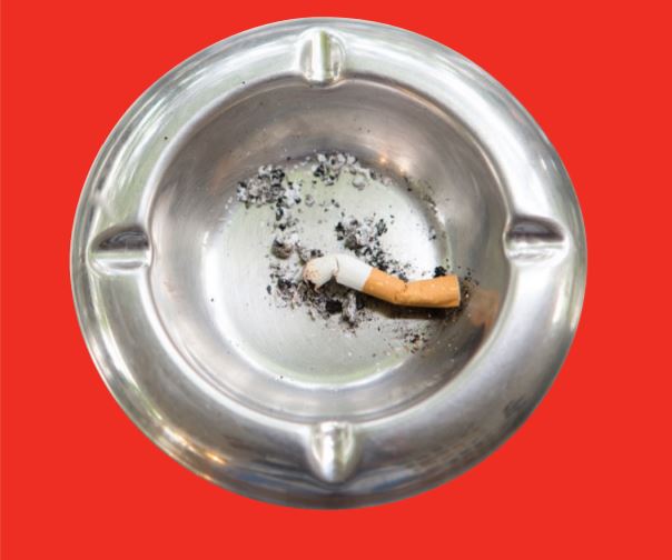 Ashtray with discarded cigarette