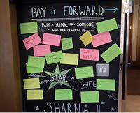 Pay it forward board at Kettle + Crust cafe in Hammersmith