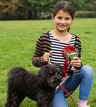 Florence Green with dog Max at Ravenscourt Park dog show